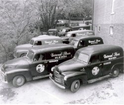 Universal Floors, Inc. in Washington, DC, at 5500 MacArthur Blvd NW, circa 1957. The '49 Chevys were purchased used from the U.S. Post Office. View full size.