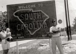 That's me with my parents at the North-South Carolina border in 1961. Dad was being transferred to Parris Island, S.C., from Camp Lejeune, N.C., to begin his first tour as a Marine Corps drill instructor. View full size.