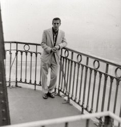 My dad on top of the Eiffel Tower when he was 19 and in the Army. Dec 31, 1956.