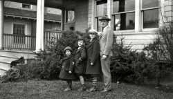 Dad and his kids I presume posing at home. Unknown location but likely somewhere in New England. From my negatives collection. View full size.
(ShorpyBlog, Member Gallery)