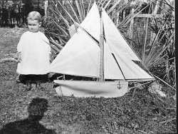 This is my grandmother with her sailboat that was hand built by my Great Grandfather (taking the photo) in Homosassa, Florida.  Photo taken somewhere around 1918.  I have the sailboat and I am working on replacing sails and hardware that were lost over the years.