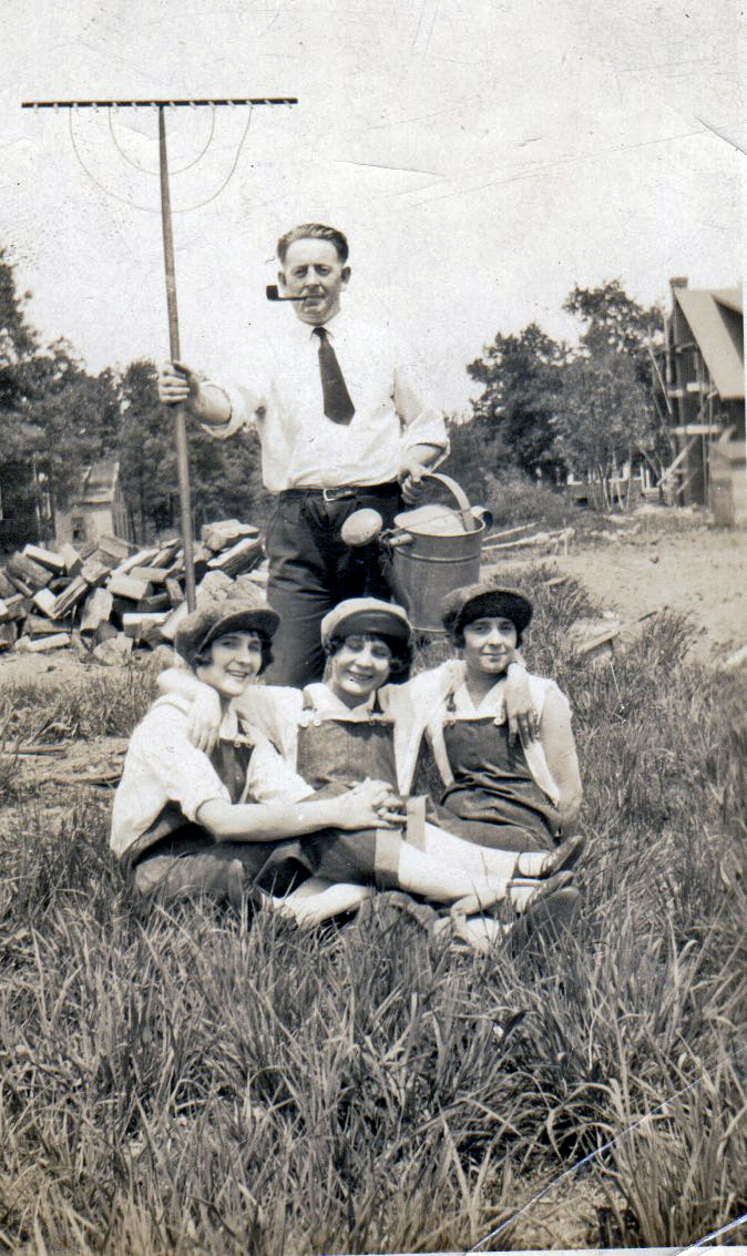 12 Columbia Street, Wilmington MA around 1925. My Grandfather Gardner Ritchie standing over his soon to be sister in laws, Helen and Anna Porter - with Nellie Frotton (of 25 Columbia St) on the right. View full size.
