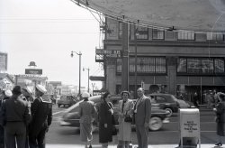 This picture was taken in the 50's at the corner on 1645 Vine street. The Broadway building is still there but not for long. View full size.
Clear instructions.The garbage can at right tells people exactly what it is for. Maybe this is why people today have so much trouble using one.
Of CourseOf course those clear instructions could have a little to do with the receptacle's passing resemblance to a mail box.
The Broadway HollywoodThe Broadway building is still there. It was successfully converted to condos. It's just about everything on the east side of Vine Street that fell to the wrecking ball. The Taft Building remains, as does the facade of Bernard Luggage, but everything else, from Hollywood Boulevard to Selma and from Vine to Argyle is the new W Hotel and condos. While I'm happy that some of Hollywood's history has been saved, I'm afraid it will soon become a bland shadow of its former self.
The attached photo was taken on 1/22/10. The view is looking north from Selma. The other is the facadectomy of Bernard Luggage.
(ShorpyBlog, Member Gallery)