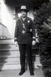 This is my grandfather, Harry Ritchie, also known as "Kiddo," standing in front of his house in Bristol, Connecticut. I believe this image was taken around 1940-41. Kiddo was a sergeant in the Connecticut State police for well over 20 years. View full size.