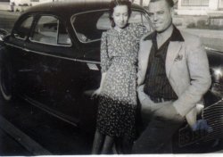 From my grandmother's photo album. I'm thinking that they were friends of my grandparents, no note of who they are, but he a sharp dressed guy, looks slightly sinister. Taken in the early 1940's. View full size.