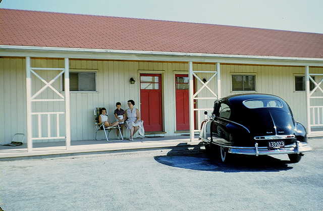 My sister and mother and me on a family road trip in our beautiful black Nash. I loved that car, and thought it was incredibly elegant. I still do. I'm hoping that someone can identify the specific model and year of the car.
The year must be around 1955, and the motel is probably in Maine, New Hampshire or Vermont, but it could also be in New York, New Jersey or Pennsylvania.  
Scanned from a slide taken by my father, Oseo Peter Balestracci. View full size.
