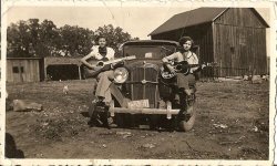 Two Milk Maids entertaining the chickens near LaCrosse, Wis., in the 1930s 