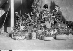 Another photo from my grandmother's photo album, dated 1927, not sure if these are relatives or just strangers that someone happened to take a photo of. View full size.