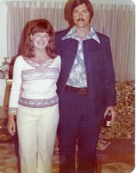 It was New Year's Eve, 1975 in Naples, Florida and my wife Barb and I are set to boogie the night away.  I'm looking good in my pressed Jack Nicklaus leisure suit with obligatory wide belt and bottle of Schlitz in hand.  We danced the night away to K.C. and The Sunshine Band and Hot Chocolate.
I still shake my head when I look at that haircut and the outfit I wore that night. Cool then but laughable to the point of being a curio now. Still, it's a nice reminder of younger times and my wife is as beautiful as ever 35 years later. 