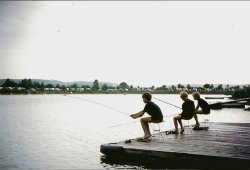 My brothers and me (I'm in the middle) with our home-made fishing rods on holiday in West Germany, August, 1970. View full size.