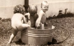 Helen Spach is on the far left, in the middle is my Granny Annie Spach, and on the far right is a neighborhood kid. This picture was taken in Miami around the late twenties. View full size.