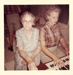 My great-great grandma Keeler, next to her daughter Portia, who is playing the organ. It's August 1960, Miami. She looks like she's having fun. View full size.