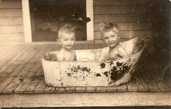 Just a couple of kids in a tub. It was taken in the early 1900s in Perry, OK. A least one of the kids is apart of the Keeler family. View full size.