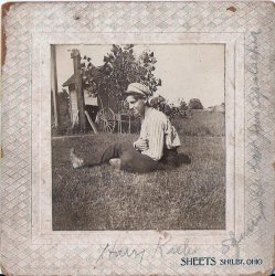 This is my great-great grandfather's cousin or brother Harry Keeler. It's the late 1890s or early 1900s in Perry, Oklahoma. I wonder how he trained that squirrel to sit on his back. View full size.