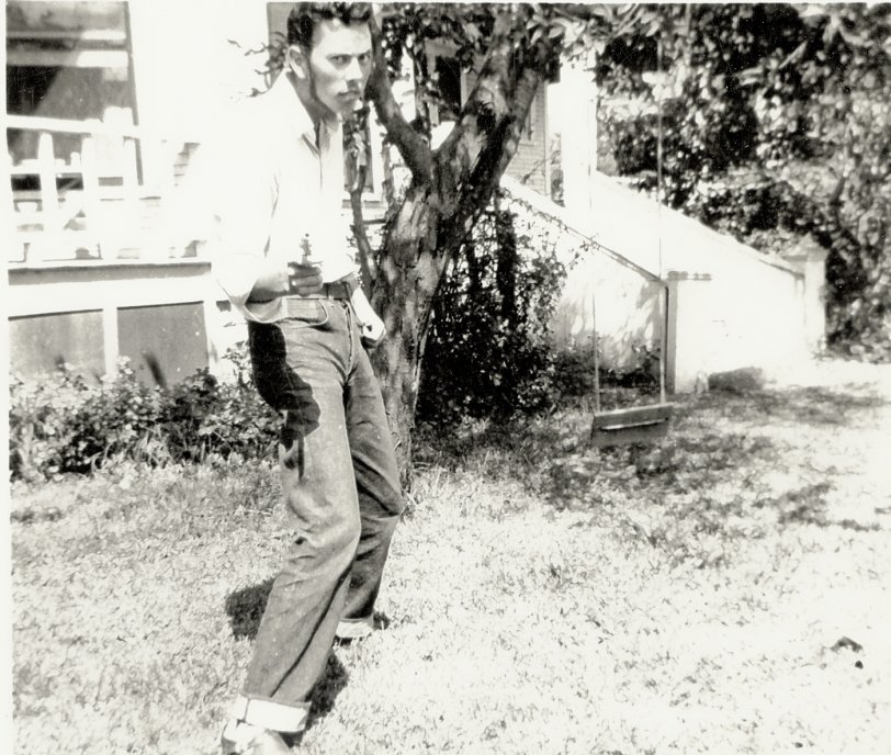 My Grandfather acting like a gun slinging cowboy for the Kiowa, Kansas, centennial. View full size.
