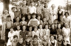 June 3, 1938. Both my dad and uncle are among the students of this "whole school picture" from their rural one room schoolhouse, found in what is now Bruce County, Ontario. The identifying slate was certainly an aid to dating it! View full size